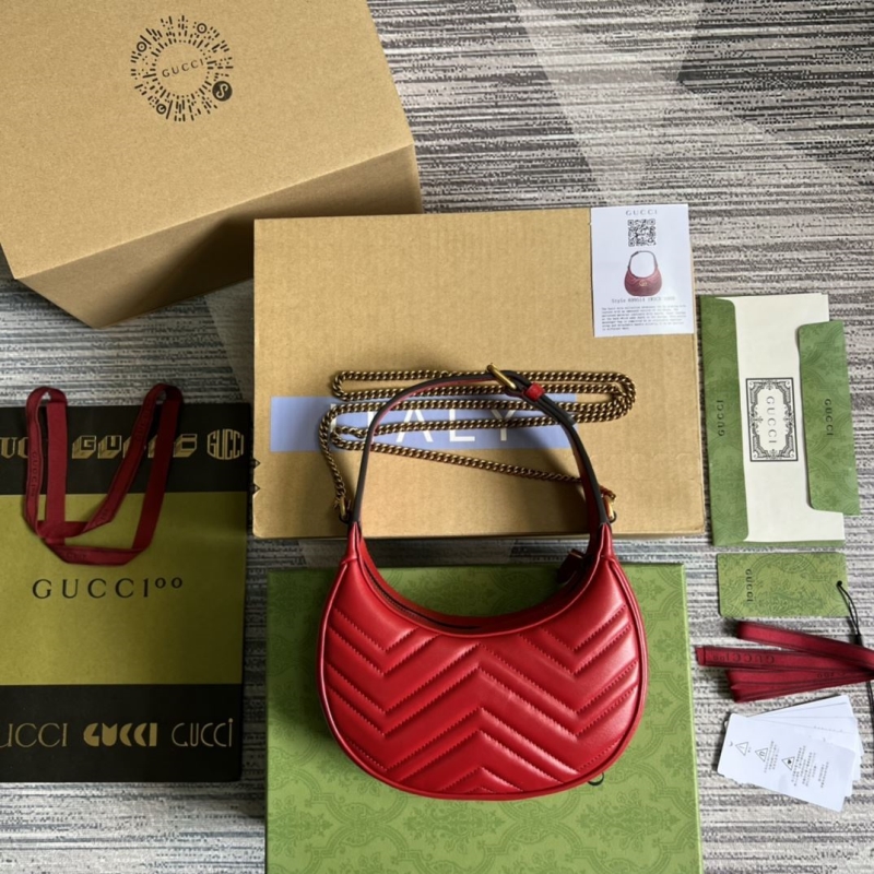 G*u*i top handle bags